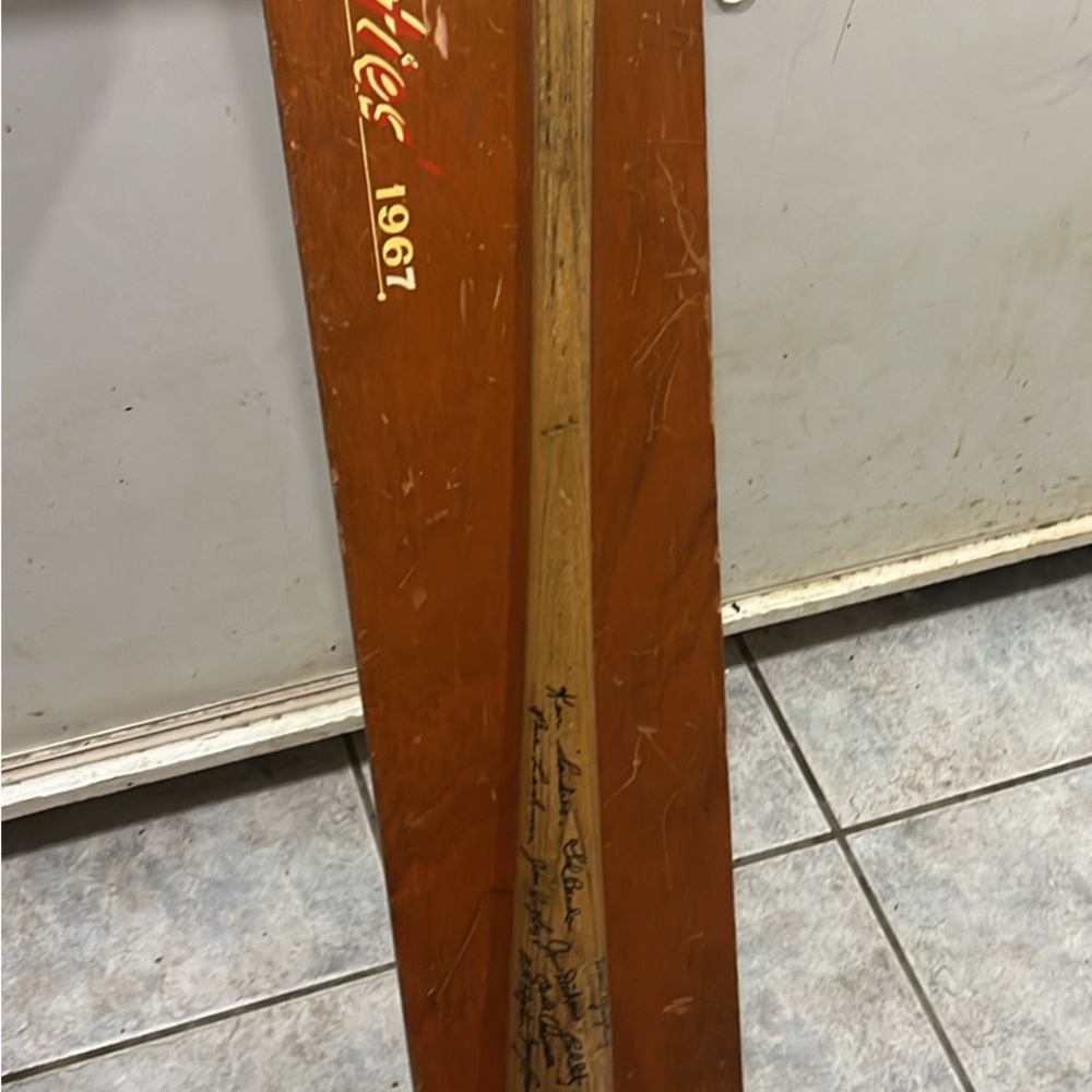 Collectable sports memorabilia 1967 Mounties baseball bat signed by the team
